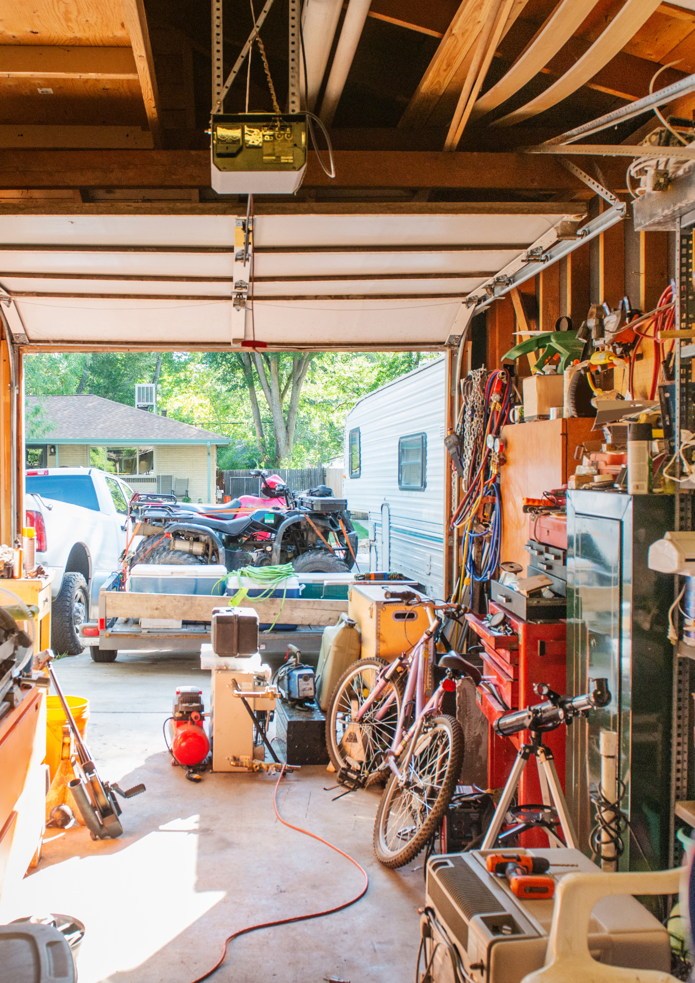 This is a picture of a garage that needs some decluttering.